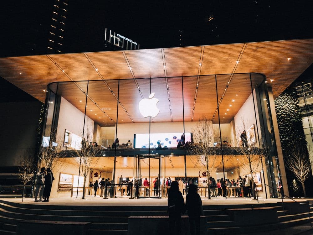 Apple tops 5 trillion dollars as profit climbs but shares slip on results